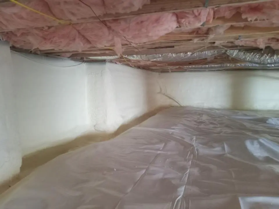 Crawl space encapsulation with closed-cell spray foam for Storm Damage Roof Repair in Davison
